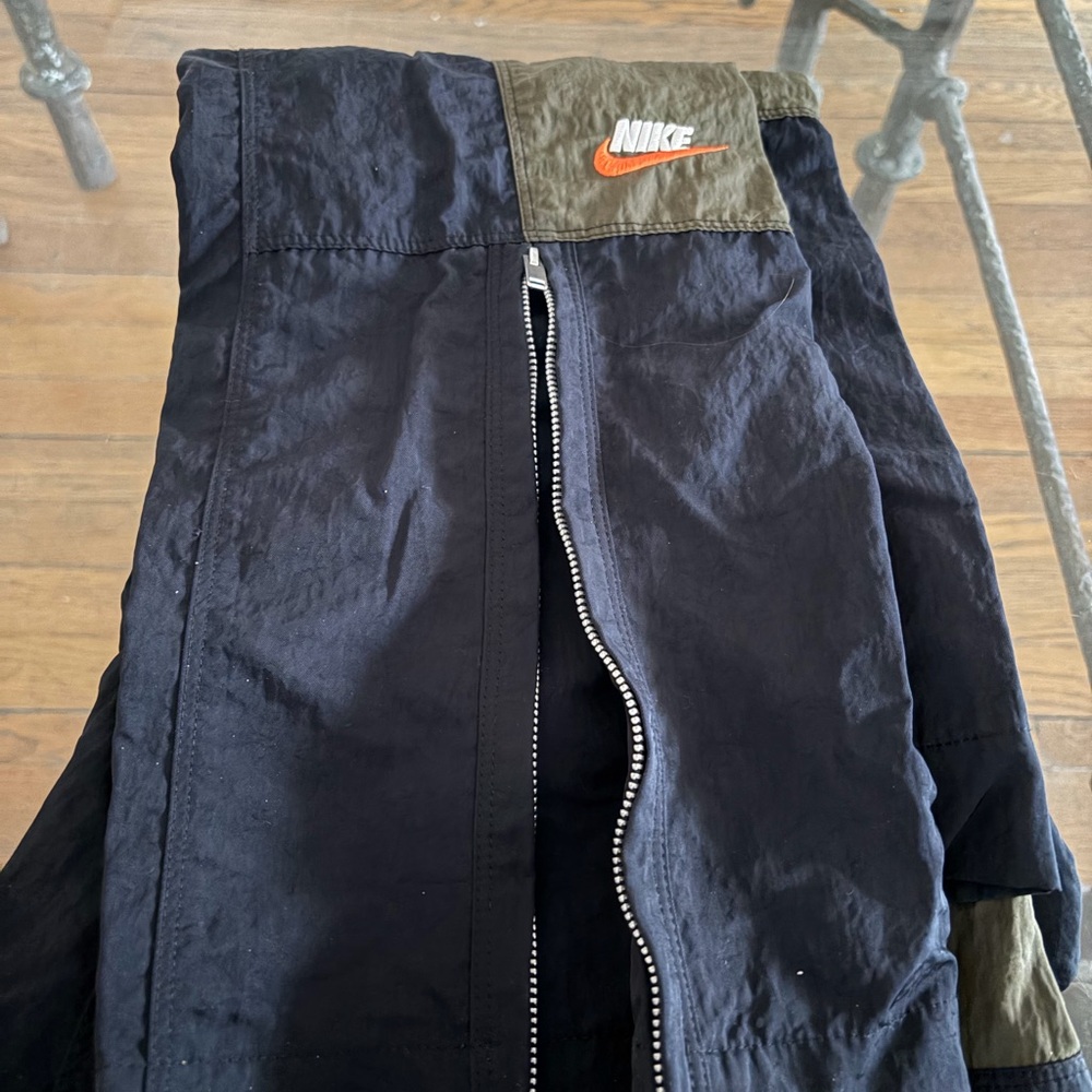 Nike Black and Olive Green Jacket with Orange Swoosh